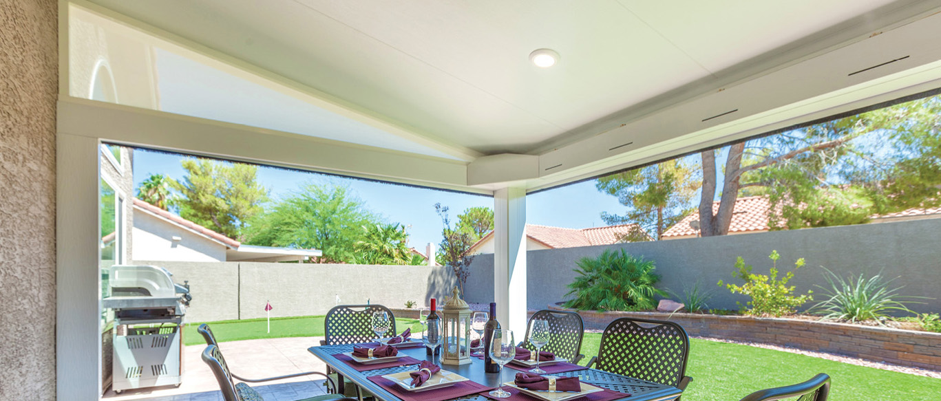 Covered patio with outdoor dining area and shade structure in Rancho Cucamonga CA