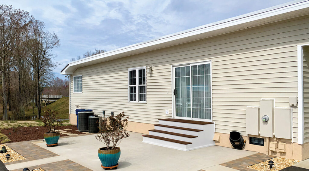 Backyard patio area without cover showing full sun exposure in Rancho Cucamonga CA