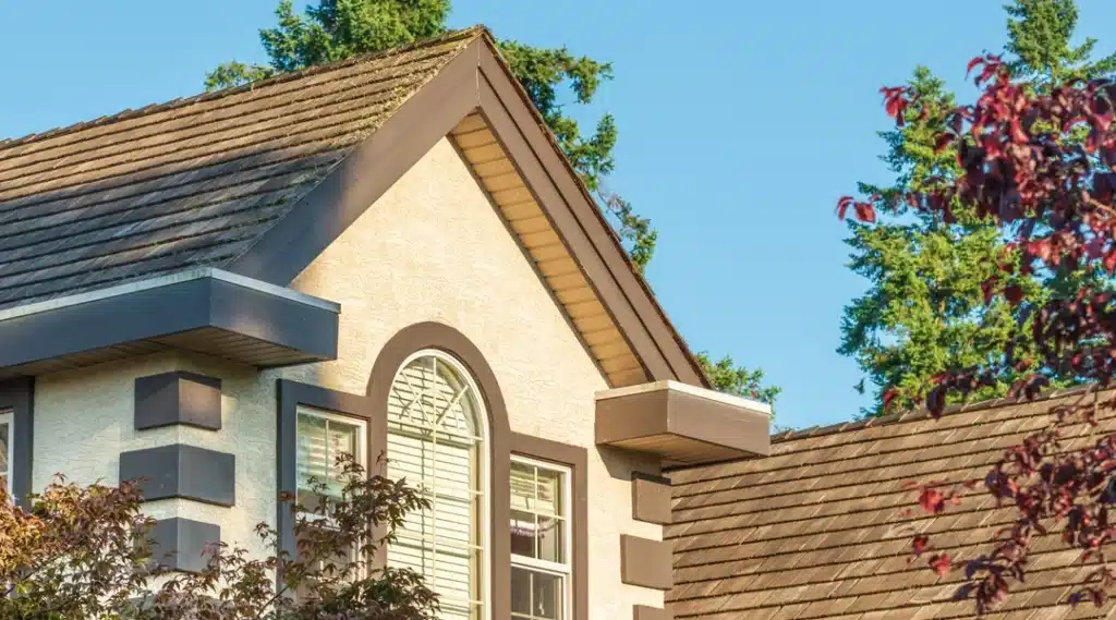 Older residential roof with visible wear that may affect insurance coverage in California