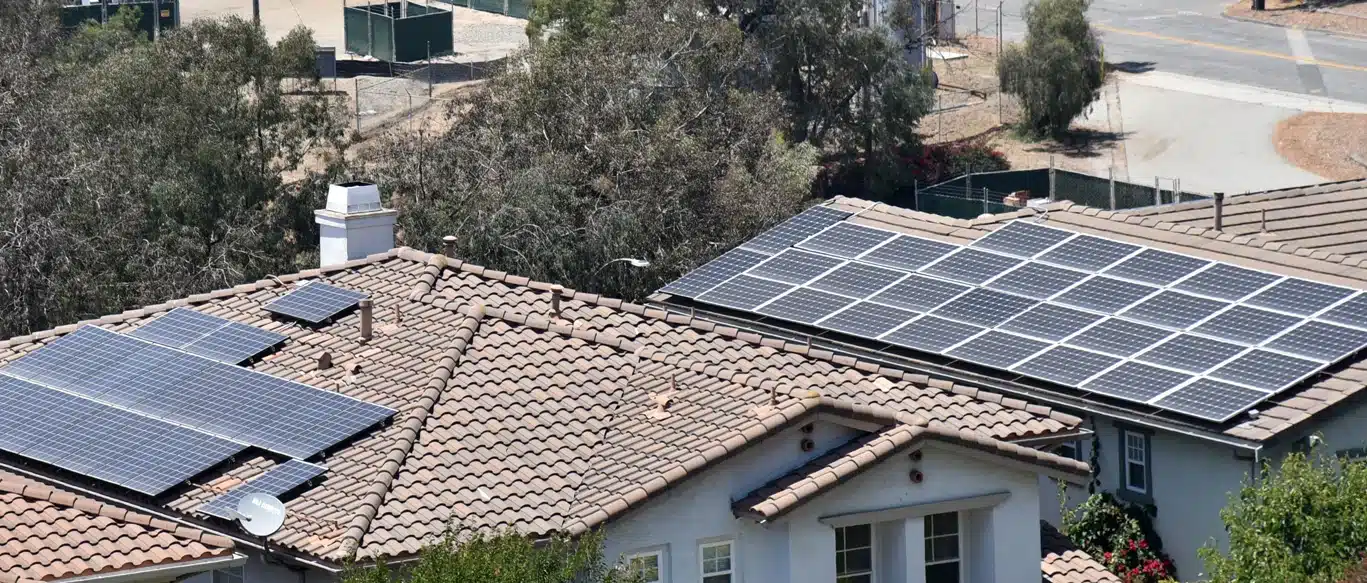 Solar panels installed on a Southern California tile roof with multiple roof sections